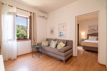 Muline, Sala de estar in the apartment, air condition available y WiFi.