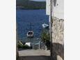 Courtyard Vis, Vis, Courtyard 8525 - Apartments near sea with pebble beach.