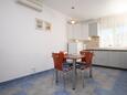 Dining room Seget Vranjica, Dining room in the apartment, air condition available, (pet friendly) and WiFi.