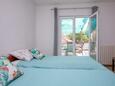 Biograd na Moru, Ložnice 2 v ubytování typu apartment, domácí mazlíčci povoleni a WiFi.