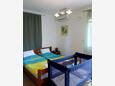 Ložnice Vinišće, Ložnice v ubytování typu studio-apartment, s klimatizací a WiFi.