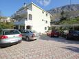 Parking lot Dugi Rat, Omiš, Parking lot 8667 - Apartments with pebble beach.