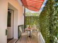 Terrace Duće, Terrace in the apartment, with a sea view and WiFi.
