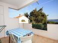 Terrace 1 Zavala, Terrace 1 in the apartment, with a sea view, (pet friendly) and WiFi.