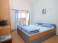 Hvar, Chambre dans l’hébergement en type studio-apartment, climatisation disponible et WiFi.