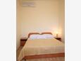 Mlini, Bedroom in the apartment, air condition available and WiFi.