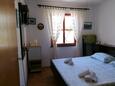 Ložnice Komiža, Ložnice v ubytování typu room, s klimatizací a WiFi.