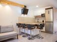 Dining room Milna, Dining room in the apartment, air condition available, (pet friendly) and WiFi.
