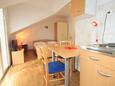 Jídelna Komiža, Jídelna v ubytování typu studio-apartment, s klimatizací, domácí mazlíčci povoleni a WiFi.