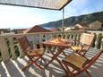 Terrace Komiža, Terrace in the studio-apartment, with a sea view, (pet friendly) and WiFi.