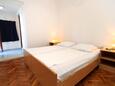 Ložnice Molunat, Ložnice v ubytování typu room, s klimatizací a WiFi.