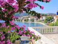 Marina, Trogir, Courtyard 9035 - Apartments near sea with pebble beach.