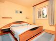 Спальня 1 Lumbarda, Спальня 1 в размещении типа apartment, WiFi.