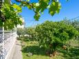 Trogir, Trogir, Courtyard 9209 - Apartments with pebble beach.