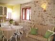 Living room Komiža, Living room in the apartment, air condition available and WiFi.