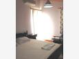 Ložnice Korčula, Ložnice v ubytování typu room, s klimatizací, domácí mazlíčci povoleni a WiFi.