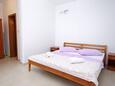 Lumbarda, Dormitorio in the studio-apartment, air condition available y WiFi.