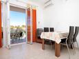 Dining room Lumbarda, Dining room in the apartment, air condition available, (pet friendly) and WiFi.