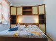 Bedroom 1 Lumbarda, Bedroom 1 in the apartment, air condition available and WiFi.
