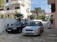 Novalja, Pag, Parking lot 9339 - Apartments with pebble beach.