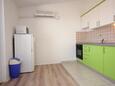 Mandre, Kitchen in the apartment, air condition available and WiFi.