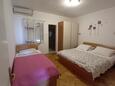 Kustići, Bedroom 1 in the apartment, air condition available and WiFi.