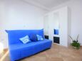Obývací pokoj Vlašići, Obývací pokoj v ubytování typu studio-apartment, s klimatizací a WiFi.