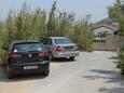 Parking lot Pag, Pag, Parking lot 9408 - Apartments with pebble beach.