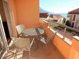 Duće, Terrace in the apartment, with a sea view and WiFi.