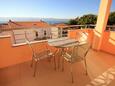 Terrace Duće, Terrace in the apartment, with a sea view and WiFi.