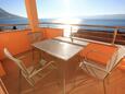 Terrace Duće, Terrace in the apartment, with a sea view and WiFi.