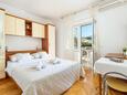 Bedroom Duće, Bedroom in the studio-apartment, air condition available and WiFi.