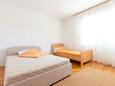 Спальня 1 Podstrana, Спальня 1 в размещении типа apartment, Домашние животные допускаются и WiFi.