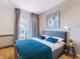 Ložnice 1 Rabac, Ložnice 1 v ubytování typu apartment, domácí mazlíčci povoleni a WiFi.