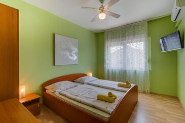 Mali Lošinj, Спальня в размещении типа room, доступный кондиционер и WiFi.