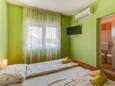 Mali Lošinj, Спальня в размещении типа room, доступный кондиционер и WiFi.
