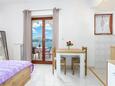 Dining room Okrug Gornji, Dining room in the studio-apartment, air condition available, (pet friendly) and WiFi.