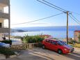 Parking lot Mali Rat, Omiš, Parking lot 9698 - Apartments with pebble beach.