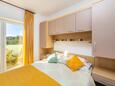 Slaapkamer Podaca, Slaapkamer in the studio-apartment, air condition available en WiFi.