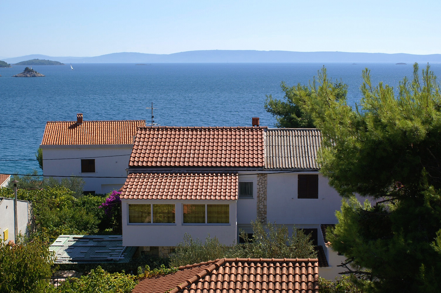 Two bedroom apartment with terrace and sea view Seget Vranjica, Trogir A-a