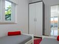 Seget Vranjica, Ložnice 2 v ubytování typu apartment, domácí mazlíčci povoleni a WiFi.