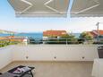 Seget Vranjica, Terrace - view in the apartment, (pet friendly) and WiFi.