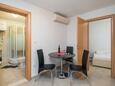 Dining room Seget Vranjica, Dining room in the apartment, air condition available, (pet friendly) and WiFi.
