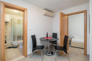 Dining room Seget Vranjica, Dining room in the apartment, air condition available, (pet friendly) and WiFi.