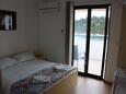 Ložnice Zaklopatica, Ložnice v ubytování typu room, s klimatizací, domácí mazlíčci povoleni a WiFi.